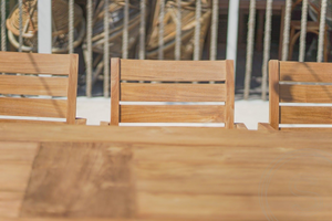 Teak tuintafel 280 x 100 + 10 stapelbare tuinstoelen stacking